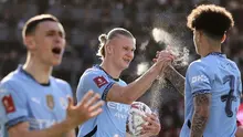 Bomber Manchester City, Erling Haaland, merayakan gol yang dicetaknya ke gawang Bournemouth dalam laga perempat final Piala FA 2024/2025 di Vitality Stadium, Minggu (30/3/2025). (AP Photo/Ian Walton)