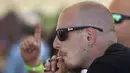 Warga AS mengisap ganja berkumpul di acara 'Weed the People' merayakan legalisasi penggunaan ganja di Portland, Oregon (3/7/2015).  Pemerintah Oregon telah melegalkan penggunaan ganja Pada 1 Juli lalu sebagai kepentingan medis. (REUTERS/Steve DiPaola)