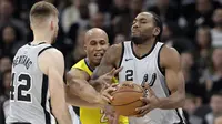 Aksi Kawhi Leonard saat Spurs melawan Nuggets (AP)