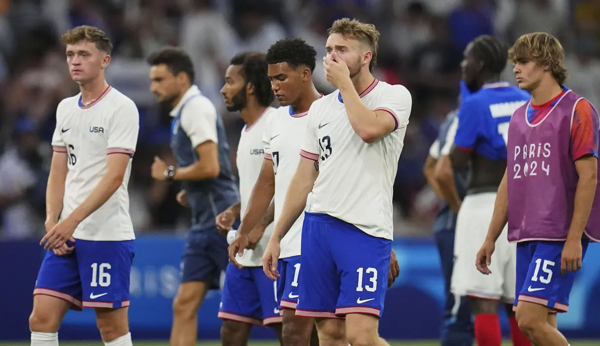Dengan kemenangan ini, Prancis memimpin klasemen Grup A dengan tiga poin. Sebaliknya, Amerika Serikat harus puas berada di dasar klasemen tanpa poin. (AP Photo/Daniel Cole)