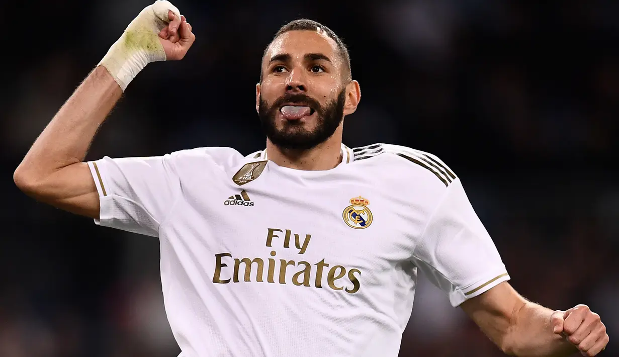 5. Karim Benzema (65 gol) - Pemain asal Prancis ini memiliki ketajaman dalam mencetak gol di kompetisi Liga Champions. Dari seluruh penampilannya bersama Real Madrid dan Lyon, Benzema telah mengoleksi 65 gol di Liga Champions. (AFP/Oscar Del Pozo)