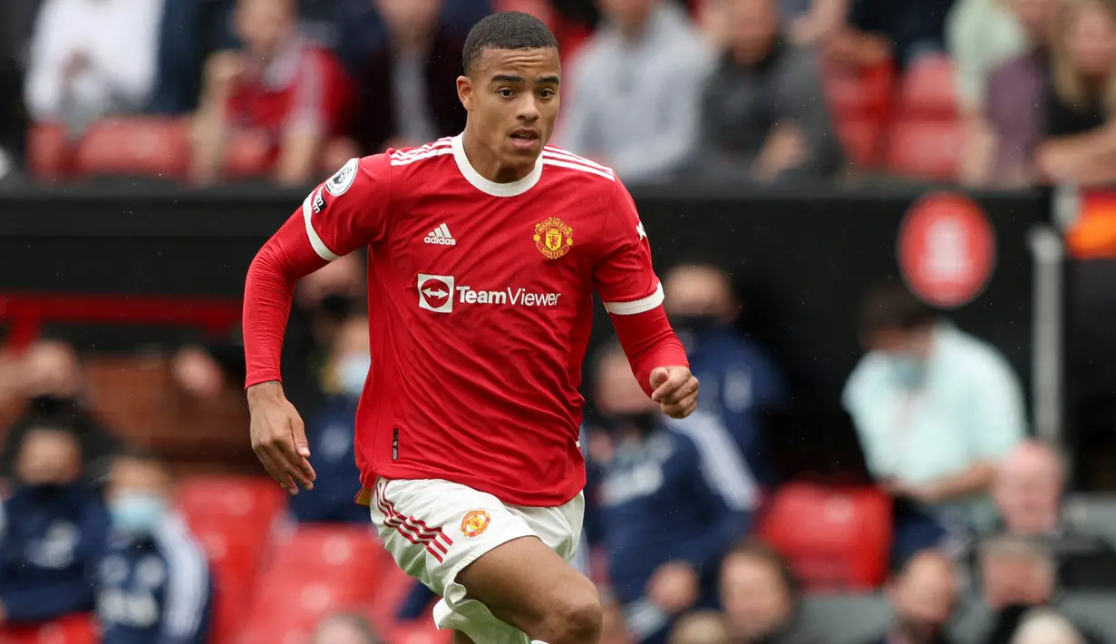 Mason Greenwood. Striker Manchester United ini hanya sekali absen dalam 11 laga Setan Merah di Liga Inggris musim ini dan semuanya manjadi starter. Kelemahannya adalah masih belum dapat meredam sikap egoisnya. Marcus Rashford cocok menggantikannya sebagai starter. (AFP/Adrian Dennis)