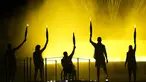 Atlet Charles-Antoine Kouakou, Nantenin Keita, Fabien Lamirault, Alexis Hanquinquant dan Elodie Lorandi mendongak setelah menyalakan api di cauldron pada Upacara Pembukaan Paralimpiade Paris 2024, Rabu (28/8/2024). (AP Photo/Christophe Ena)