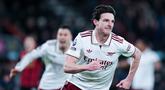 Gelandang Arsenal, Declan Rice, melakukan selebrasi setelah mencetak gol ke gawang Bournemouth pada pekan ke-20 Liga Inggris 2025/2026 di Vitality Stadium, Minggu (04/01/2026) dini hari WIB. (AP Photo/Alastair Grant)
