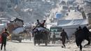 Diketahui sejak 2 Maret 2025, pemerintah Israel memblokade masuknya seluruh pengiriman bantuan kemanusiaan ke wilayah Gaza. (Bashar TALEB/AFP)