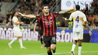 Pemain AC Milan, Christian Pulisic, merayakan gol ke gawang Lecce dalam laga babak kedua Coppa Italia 2025/2026 di San Siro, Milan, Rabu (24/9/2025) dini hari WIB. AC Milan melangkah ke 16 besar lewat kemenangan telak 3-0. (AP Photo/Luca Bruno)