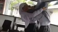 Potongan video viral aksi dua siswa di Gorontalo (Arfandi Ibrahim/Liputan6.com)