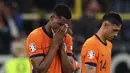 Reaksi bek Belanda #22 Denzel Dumfries setelah kalah dari Inggris pada laga semifinal Euro 2024 di Signal Iduna Park, Kamis (11/7/2024). (Adrian DENNIS / AFP)
