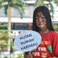 Aksi kampanye memperingati Global Tiger Day di Lapangan Merdeka, Medan, Sumatera Utara, Minggu (9/8/2015). (Liputan6.com/Reza Perdana)