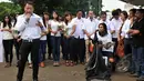 Vicky Prasetyo dan Charli saat 'Aksi Maha Damai' di depan Istana Negara terkait kasus KPK vs Polri bersama Komunitas Anak Bangsa, Jakarta, Selasa (3/2/2015). (Liputan6.com/Panji Diksana)