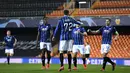 Gelandang Atalanta, Josip Ilicic berselebrasi usai mencetak gol ke gawang Valencia pada pertandingan leg kedua babak 16 besar Liga Champions di Mestalla, Spanyol (10/3/2020). Ilicic mencetak empat gol dipertandingan ini dan mengantar Atalanta menang 4-2 atas Valencia. (UEFA via AP)