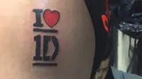 Namun, karena bukan penduduk tetap Tennessee, ia tidak bisa mengikuti kompetisi. Namun tattoo berbunyi “I Love 1D” sudah terlanjur menempel.