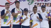 Acara pawai obor Asian Games 2018 di Kota Palembang, Sumatera Selatan, Sabtu (4/8/2018). (Bola.com/Reza Bachtiar)
