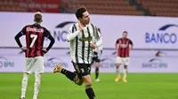 Juventus mampu hadirkan kekalahan perdana untuk AC Milan di Serie A musim ini, Kamis dini hari WIB. Tampak Federico Chiesa usai cetak gol ke gawang I Rossoneri. (MIGUEL MEDINA / AFP)