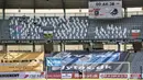 'Penonton' karton dipasang sebelum pertandingan Liga Denmark antara AGF dengan Randers FC melalui di Ceres Park, Aarhus, Denmark, Kamis (28/5/2020). Laga ini menjadi pertandingan pertama yang melibatkan suporter melalui aplikasi pertemuan virtual. (Henning Bagger/Ritzau Scanpix via AP)