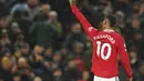 Penyeranga Manchester United, Marcus Rashford berselebrasi usai mencetak gol ke gawang Bournemouth pada pertandingan lanjutan Liga Inggris di Old Trafford di Manchester, Inggris, Rabu (4/1/2023). Manchester United menang telak atas Bournemouth dengan skor 3-0. (AP Photo/Dave Thompson)