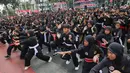 Pesilat dari berbagai perguruan silat se-Jabodetabek mengikuti Flash Mob Pencak Silat saat kegiatan CFD di kawasan Bundaran HI Jakarta, Minggu, 9 Agustus 2026. (KLY/Arie Basuki)