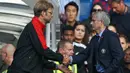 Pertemuan Jose Mourinho dan Jurgen Klopp berakhir kemenangan untuk Liverpool pada laga lanjutan Liga Premier Inggris di Stamford Bridge. (AFP Photo/Justin Tallis) 