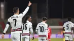 Striker Portugal, Cristiano Ronaldo (kiri) melakukan selebrasi usai mencetak gol kedua Portugal ke gawang Luksemburg dalam laga Kualifikasi Piala Dunia 2022 Zona Eropa Grup A di Josy Barthel Stadium, Luksemburg, Selasa (30/3/2021). Portugal menang 3-1 atas Luksemburg. (AP/Olivier Matthys)