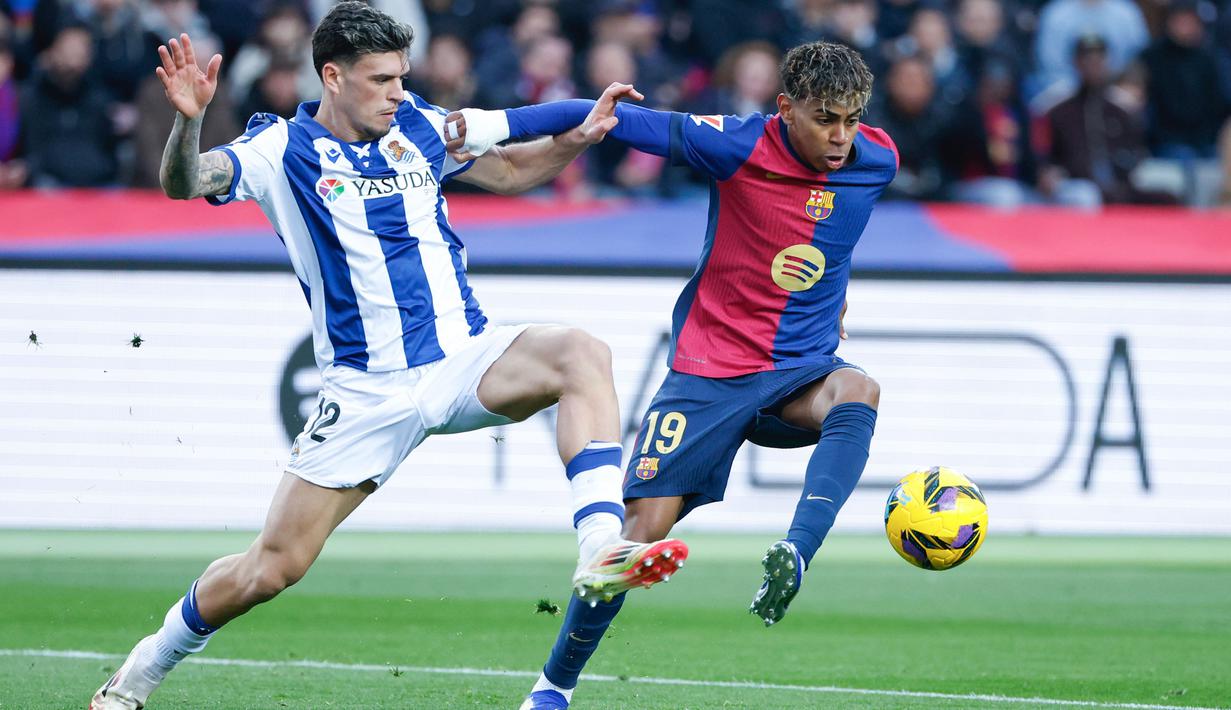 Hasil ini membuat Barcelona naik ke pucuk klasemen sementara La Liga 2024/2025 dengan koleksi 57 angka dari 26 pertandingan. Sementara itu Real Sociedad ada di posisi Sembilan dengan Raihan 34 poin saja. (AP Photo/Joan Monfort)