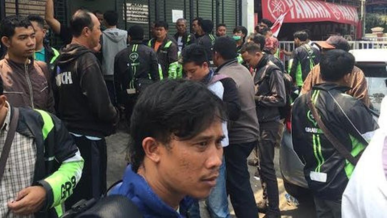 Senin depan, pengojek GrabBike dijanjikan menerima gaji