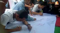 Tolak Reklamasi Teluk Benoa Bali, Warga Bubuhkan Cap Jempol Darah