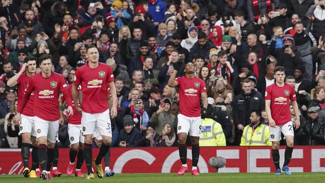 Selebrasi pemain MU saat Anthony Martial jebol gawang City