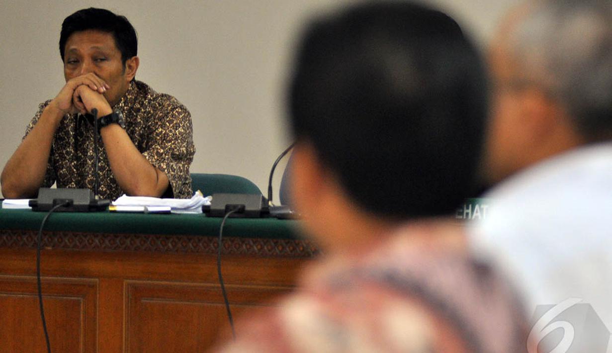 Sidang terkait kasus korupsi Hambalang ini menghadirkan terpidana kasus suap Wisma Atlet yang juga mantan Seskemenpora Wafid Muharam sebagai saksi, Jakarta, Senin (5/1/2015). (Liputan6.com/Miftahul Hayat)