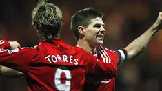 Liverpool's Steven Gerrard celebrates with Fernando Torres after Torres scored the winning goal against Preston North End during their English FA Cup match at Deepdale in Preston, on January 3, 2009. AFP PHOTO/PAUL ELLIS