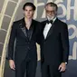 Paris Brosnan dan Pierce Brosnan saat hadir di "Fashion For Relief" charity gala event di London Fashion Week. (NIKLAS HALLE'N / AFP)