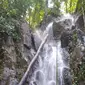 Di pelosok Kabupaten Bone Bolango, tepatnya di kawasan hutan konservasi Taman Nasional Bogani Nani Wartabone, Desa Ulanta, Kecamatan Suwawa, terdapat air terjun eksotis bernama Air Terjun Sinambo. (Liputan6.com/ Arfandi)