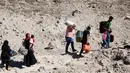 Data Pemerintah Lebanon pada Jumat (4/10/2024) menyebutkan ada lebih dari 300.000 orang menyeberang dari Lebanon ke Suriah dalam 10 hari terakhir. (HASSAN JARRAH/AFP)