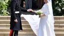 Ia pun menggunakan kesempatan tersebut untuk mencurahkan isi hatinya karena tak diundang ke Royal Wedding. (BEN STANSALL  POOL  AFP)