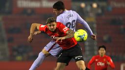 Bertandang ke Visit Mallorca Estadi, Barca mampu tampil mendominasi dengan penguasaan bola mencapai 65 persen. Alhasil pasukan Xavi itu mampu membungkus 3 poin lewat kemenangan tipis 1-0. (AP/Francisco Ubilla)