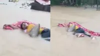 Kisah Dibalik Video Viral Pria yang Tidur Nyenyak Sembari Terapung Banjir. (Sumber: Twitter/farism4n)