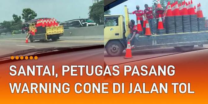 VIDEO: Santai dan Tenang, Aksi Petugas Pasang Warning Cone di Jalan Tol
