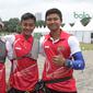 Riau Ega Agata bersama tim panahan putra dari nomor recurve lolos ke final setelah mengalahkan Malaysia pada test event Asian Games 2018. (dok. Asian Games 2018).