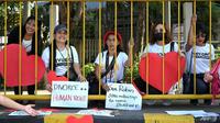 Perceraian di Filipina dipersulit, warga unjuk rasa untuk perjuangkan keadilan. (AFP)