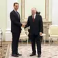 Presiden Suriah Bashar Al-Assad saat bertemu Presiden Vladimir Putin di Moskow, Rusia, pada Rabu (15/3/2023). (Dok.&nbsp;Kremlin via AP)