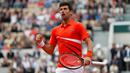 Petenis Serbia, Novak Djokovic berselebrasi setelah mencetak poin saat melawan petenis Swiss, Henri Laaksonen pada putaran kedua Prancis Terbuka 2019 di Stadion Rolland Garros, Kamis (30/5/2019). Petenis unggulan pertama itu melaju ke babak ketiga usai menang 6-1, 6-4 6-3. (AP/Jean-Francois Badias)