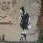 Salah satu lukisan karya Banksy, "Ratgirl" (wikimedia commons)