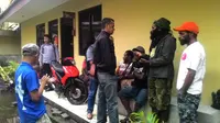 Puluhan mahasiswa asal Papua diperiksa secara intensif oleh aparat penyidik Polresta Manado. (Liputan6.com/Yoseph Ikanubun)