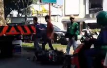 Ugal-ugalan Sambil Bunyikan Sirine, Sopir Truk Arogan Banget Cegat lalu Pukul Driver Ojol karena Tak Terima Ditegur