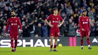 Reaksi kecewa pemain Liverpool setelah kalah 0-3 dari Wolverhampton pada laga pekan ke-22 Liga Inggris 2022/2023 di Molineux Stadium, Sabtu (04/02/2023). (AP via PA/Tim Goode)