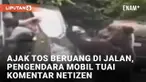 Aksi pengendara mobil ajak tos beruang di jalan mengundang perhatian