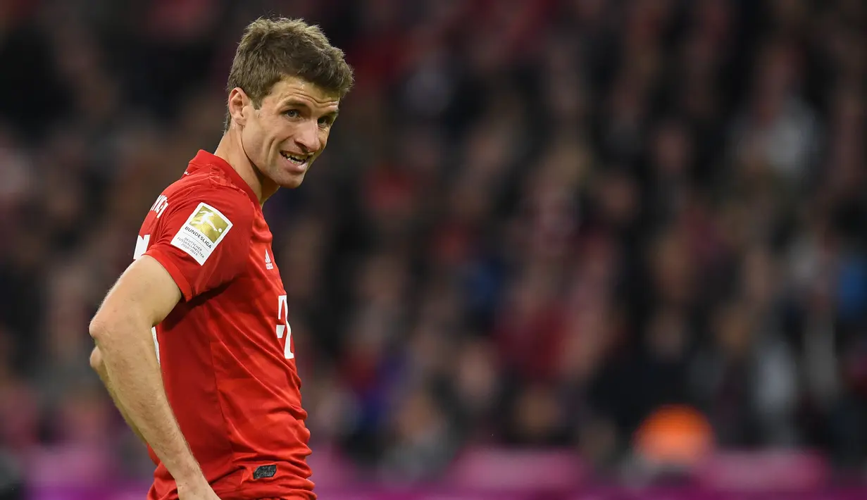 Thomas Muller - Pemain Bayern Munchen ini tampil apik sepanjang musim 2019/2020 ini. Muller mampu mengemas 16 assist dan 6 gol untuk Bayern Munchen. (AFP/Christof Stache)