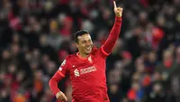 Sepanjang sejarah Liga Champions, hanya ada 8 pemain yang meraih gelar di 2 klub berbeda. Dari kedelapannya, hanya Thiago Alcantara bersama Liverpool di musim ini yang berpeluang naik kelas dan menyamai raihan Clarence Seedorf, peraih gelar dengan 3 klub berbeda. (AFP/Anthony Devlin)