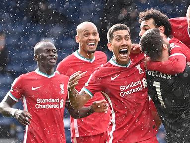 Liverpool merupakan satu-satunya klub di Liga Inggris yang belum pernah mencicipi kekalahan hingga pekan ini. The Reds sukses mengoleksi 15 poin dari 4 kemenangan dan 3 kali seri. Skuat asuhan Juergen Kopp tersebut saat ini menempati urutan kedua klasemen sementara. (AFP/Pool/Laurance Griffiths)