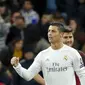 Selebrasi Cristiano Ronaldo seusai mencetak gol ke gawang AS Roma pada laga leg kedua babak 16 besar Liga Champions, Rabu (9/3/2016) dini hari WIB. (EPA/Javier Zilion)