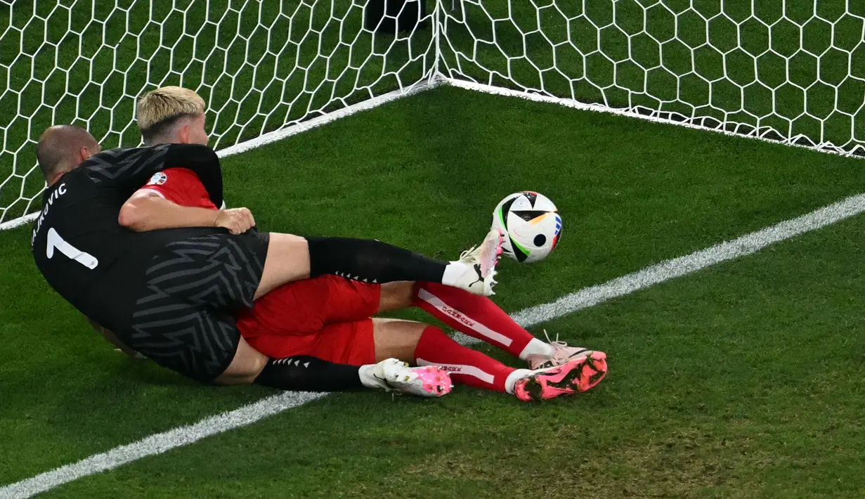 Hasil imbang ini tidak mengubah posisi kedua tim di klasemen akhir Grup C Piala Eropa 2024. (Fabrice COFFRINI / AFP)